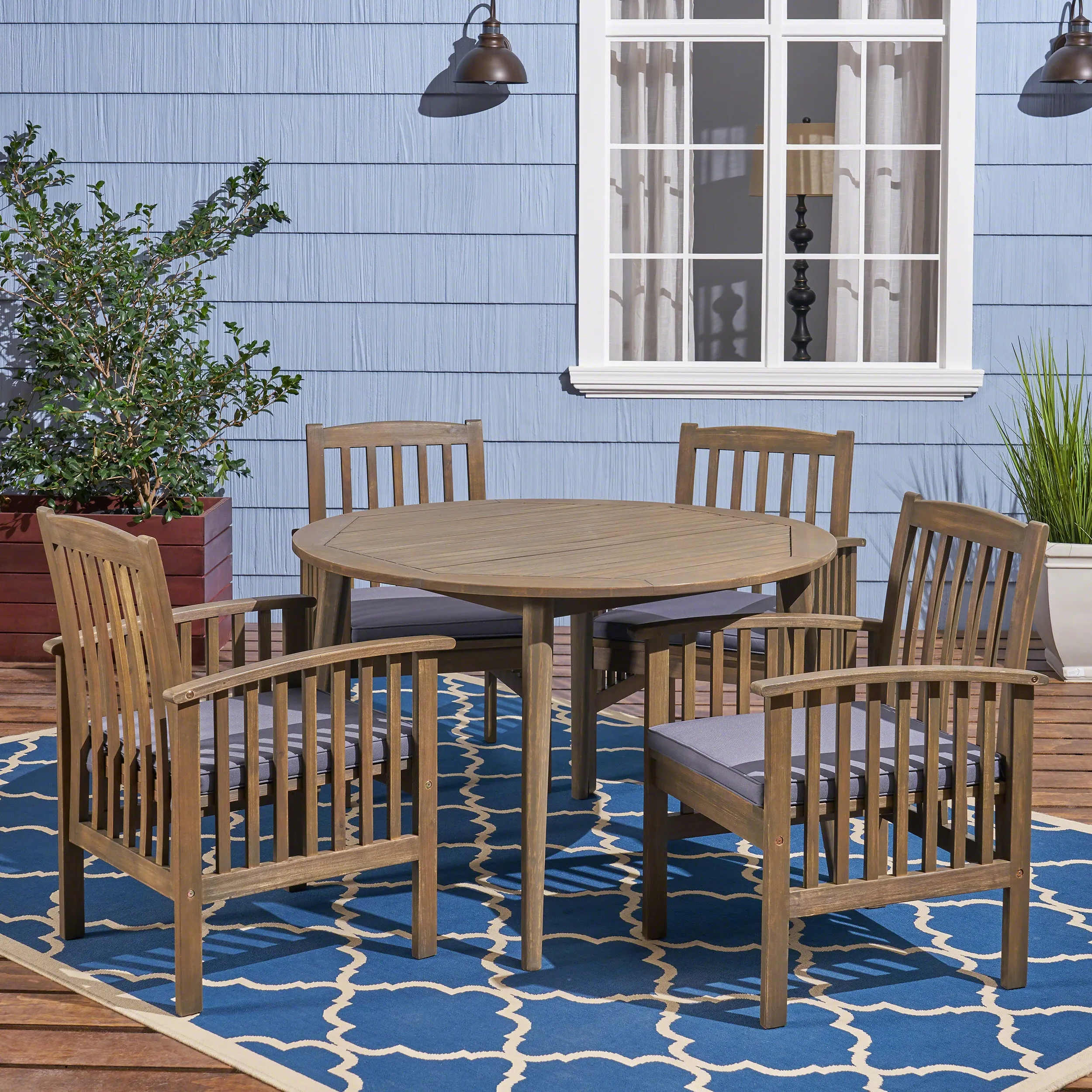 Phoenix Outdoor Acacia 4-Seater Dining Set with Cushions and 47" Round Table with Straight Legs